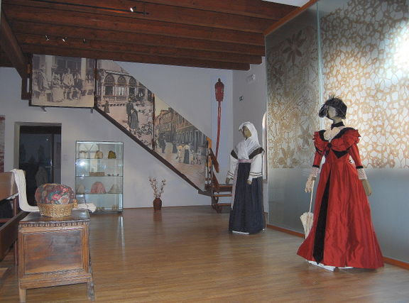 Part of the exhibited ethnological collection, Koper Regional Museum, in the main room of the 1st floor, where a new permanent exhibition entitled Woven Past was built in 2009, which outlines the path from fibres to the final product - clothes