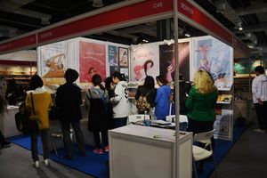 <!--LINK'" 0:448--> presenting their catalogue at the Shanghai Book Fair, 2014