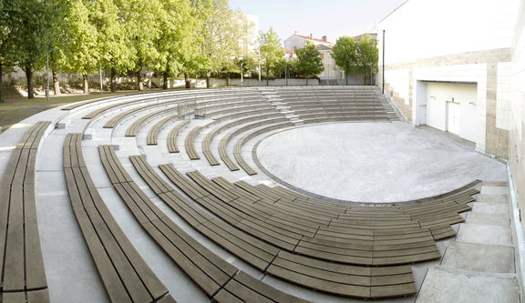 The open air summer amphitheatre of the Kosovel Culture House Sežana. Though the construction of this cultural centre started in 1979, the place first opened its doors in 1991. It was initially designed by a group of five architects – Vojteh Ravnikar, Marko Dekleva, Matjaž Garzarolli, Egon Vatovec and Mladen Marčina.
