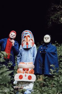 Artistic duo Twee Muizen posing with sculptor Paolo Puck at Kokra, Kranj.