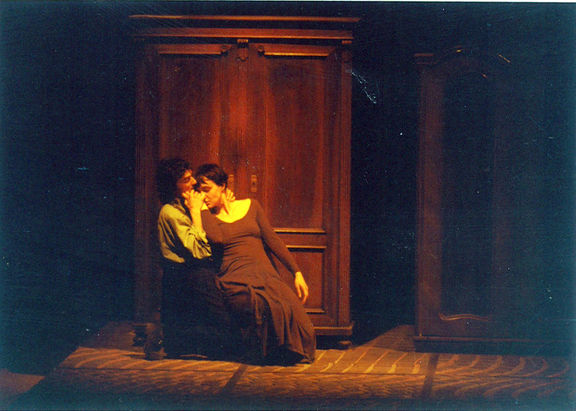 Cricket in the Fist by Muzeum Theatre, staged at the VIBA Studio, St. Joseph's Church, 1994. "The image simbolizes theatrical and art historical iconography as a time machine travelling back into middle age, to the gesture of the written word." Performing: Barbara Novakovič and Ivan Peternelj