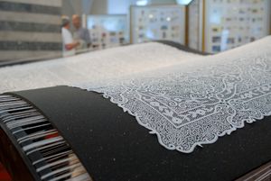 A replica of a 6 sqm large lace tablecloth, ordered and made in 1976 by 14 Idrija lacemakers from 34.560 metres of cotton tread for Tito's wife Jovanka who has never received the gift. Exhibited at <!--LINK'" 0:167-->, 2008