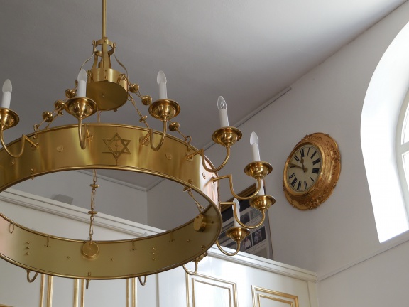 The interior of the Lendava Synagogue. The clock on the wall is the only remain of the original fittings.