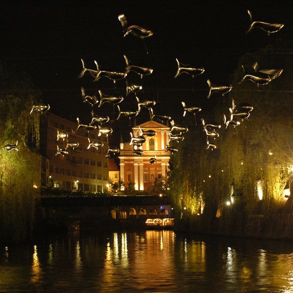 Anchovies over Ljubljanica river by French collective Aerosculpture, Lighting Guerrilla Festival, 2008