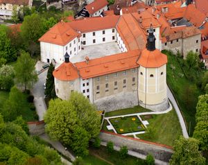 The view of the <!--LINK'" 0:9--> located in Škofja Loka. Since 1959 the castle  serves as the main venue for the archaeological, ethnological, art history, and other collections  of the <!--LINK'" 0:10-->.