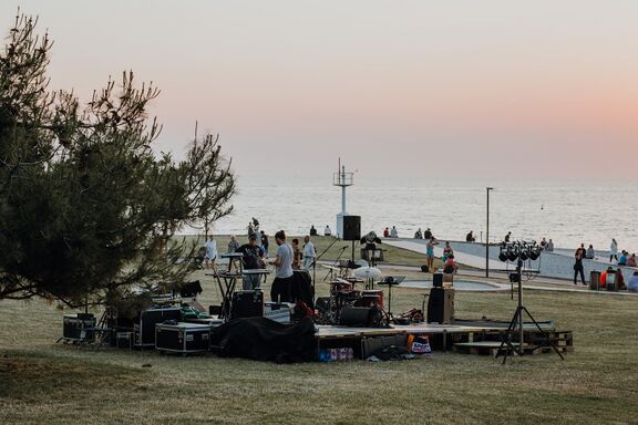 Musicians preparing for an evening performance at the Lighthouse, Kino Otok - Isola Cinema Festival 2022. Author: Amadeja Smrekar