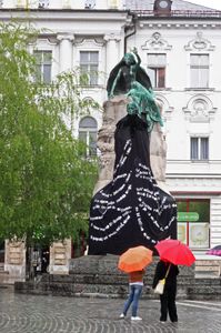 <i>Prešeren's Coat</i>, by <!--LINK'" 0:126-->, art installation using passages from the poet's longest poem <i>Krst pri Savici</i>[Baptism at Savica] on a new robe dressing Prešeren's monument,  <!--LINK'" 0:127-->, 2010