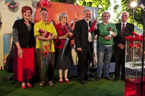 The four Levstik Award winners receiving their prizes at the award ceremony, 2009
