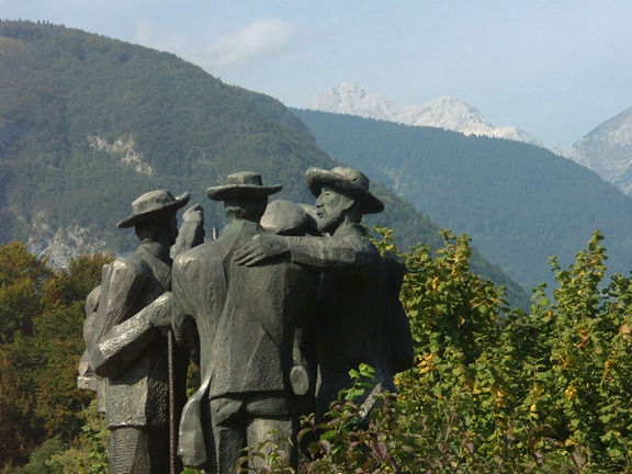 Stojan Batič's Monument to four courageous men, Ribčev Laz commemorating the first ascent to Mount Triglav in 1778, Bohinj, Gorenjska. Erected in 1978. Triglav National Park