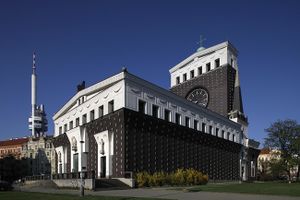 A monumental Church of the Most Sacred Heart of Our Lord, a unique modern church architecture was designed by Slovene architect <!--LINK'" 0:150--> for the Vinohrady district of Prague 1929&ndash;1932.