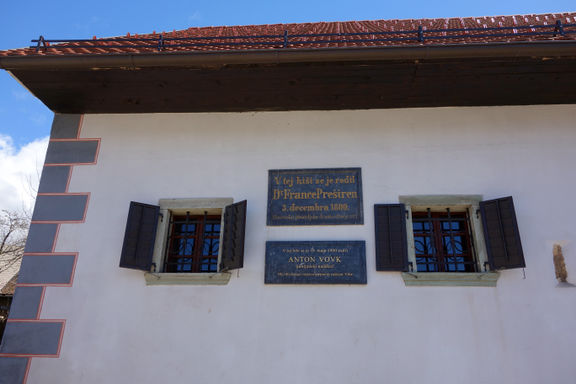 Two memorial plaques are built in the entrance façade of Birthplace of France Prešeren, commemorating the birth of France Prešeren and Archbishop Anton Vovk, 2013