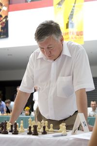 Grandmaster Anatoly Karpov as a special guest at a simultaneous chess party at the <!--LINK'" 0:376--> 2008