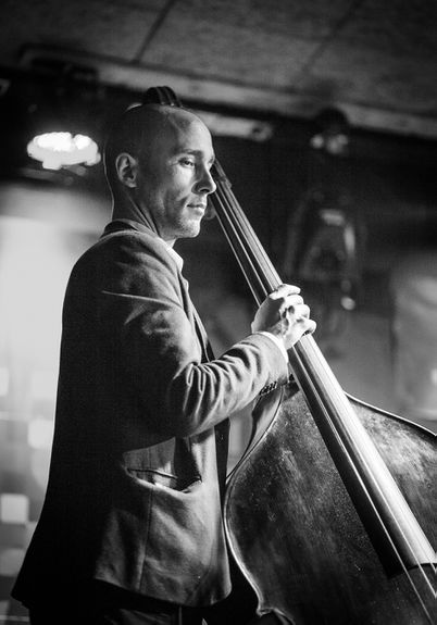 The double bass player Robert Jukič while performing in Igor Matkovič's Sonic Motion quartet at Festival of Slovenian Jazz, 2014