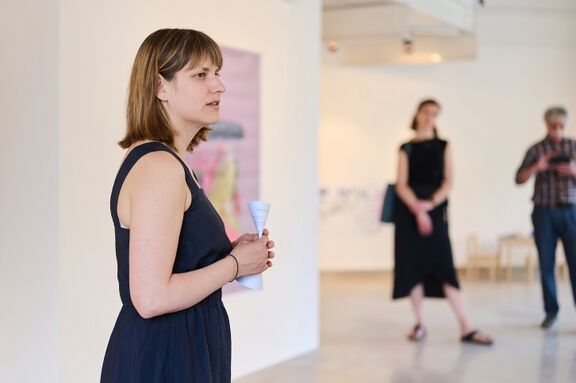 Judit Flora Schuller at the opening of her exhibition "Mothers in the Himalayas", a project conceived for the Likovni salon Celje. The artist took part at the AiR Celeia programme. Photo Tomo Jeseničnik.