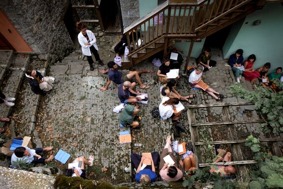 Summer school of the Academy of Margins, a collective learning experience in the village of Topolò (summer 2022). Lecture of the curator Jennifer Teets and the artist Lorenzo Cirrincione about edible clays.
