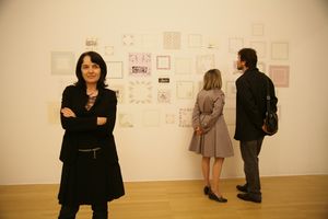 <!--LINK'" 0:94--> in front of her artistic intervention at the <i>AT HOME: Architects France and Marta Ivanšek</i> exhibition; <!--LINK'" 0:95-->, 2010
