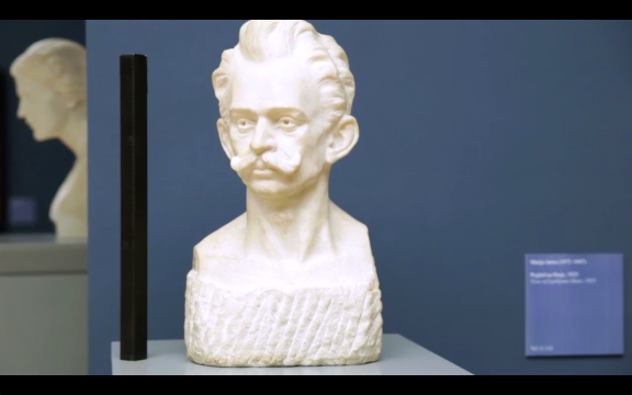 A still frame from Kulturnik.si promo video featuring a marble bust of Ivan Cankar (1876–1918), the beginner of Modernism in Slovene literature, sculpted by Antonij Repič, shot in National Gallery of Slovenia, 2013.