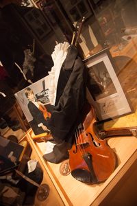 An autograph of Stefan Milenković, a Serbian child prodigy and famous concert violinist, his first violin and a frock coat. Part of the Philographic Collection of the <!--LINK'" 0:176--> at Ana's Mansion, 2012