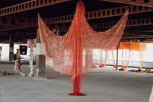 The textile installation Tears of Icarus (2023) by Japanese artist Rieko Yashiro, which was exhibited in the Globus building in Kranj as part of BIEN 2023.