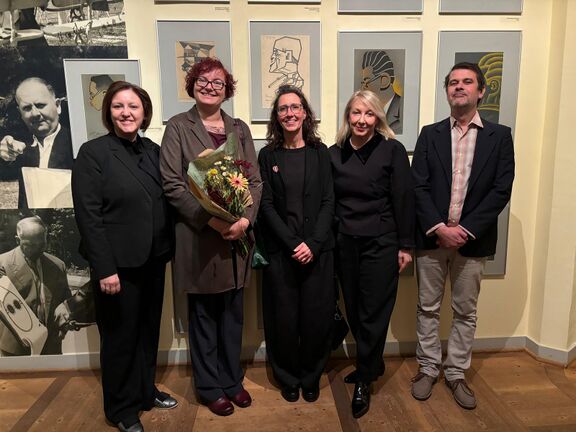 The opening of the exhibition "Ladislav Kondor: The Forgotten Cosmopolitan" at the Museum Wilhelm Busch – The German Museum for Caricature and the Art of Drawing, Hannover, 2024. From left to right: Ambassador of the Republic of Slovenia, Dr. Ana Polak Petrič, curator Tamara Andrejek, museum director Dr Eva Jandl-Jörg, Head of SKICA Berlin Saša Šavel Burkart and designer Primož Fijavž.