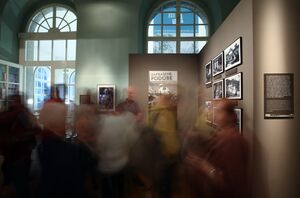 An opening ceremony at the <!--LINK'" 0:157--> in Ljubljana. A temporary exhibition presented <!--LINK'" 0:158-->'s photo documentation, 2014.