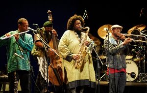 Jazz superstar Kamasi Washington and his band on the stage of Verdi Theatre in Gorizia, Italy, during his performance at Glasbe sveta 2019.