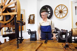 A display of old woodworking procedures at the <!--LINK'" 0:336-->, 2014