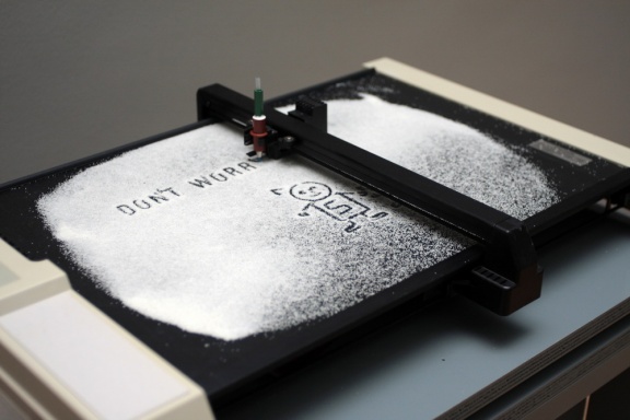 Nanoplotter uses a plotter, an obsolete printing machine from the 1980s, adapted to an uncommon operation. By the artist collective BridA at the U3, Museum of Modern Art, Ljubljana, 2010.