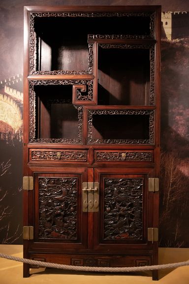 An exquisite Chinese wooden cabinet, one of the artifacts exhibited at the Slovene Ethnographic Museum in the Skušek Collection, the largest collection of Chinese objects in Slovenia.