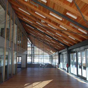 The service building Čaplja interior at the Nordic Centre Planica, designed by <!--LINK'" 0:178-->, 2016