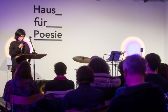 Poet Ana Pepelnik reading at Haus für Poesie, 2022. Photo: Regina Sablotny