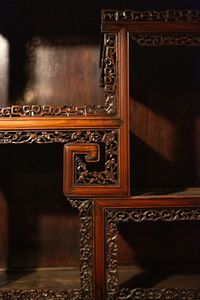 Detail of a piece of carved wooden furniture from China, Skušek Collection, <!--LINK'" 0:52-->.