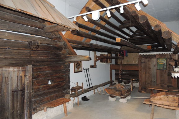 The first room in the Museum of Alpine Dairy Farming, Stara Fužina presents the interior of an alpine dairy hut with furnishings from the alpine pasture Zajamniki dated from 1849.